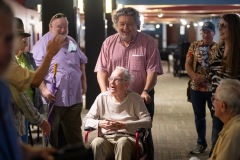 Philip Morris, CEO of Proctors Collaborative, escorts longtime Capital Region jazz historian Tim Coakley to Jazz on Jay in Robb Alley at Proctors in Schenectady on June 26, 2025. Photo by Kevin Montano for Proctors Collaborative.